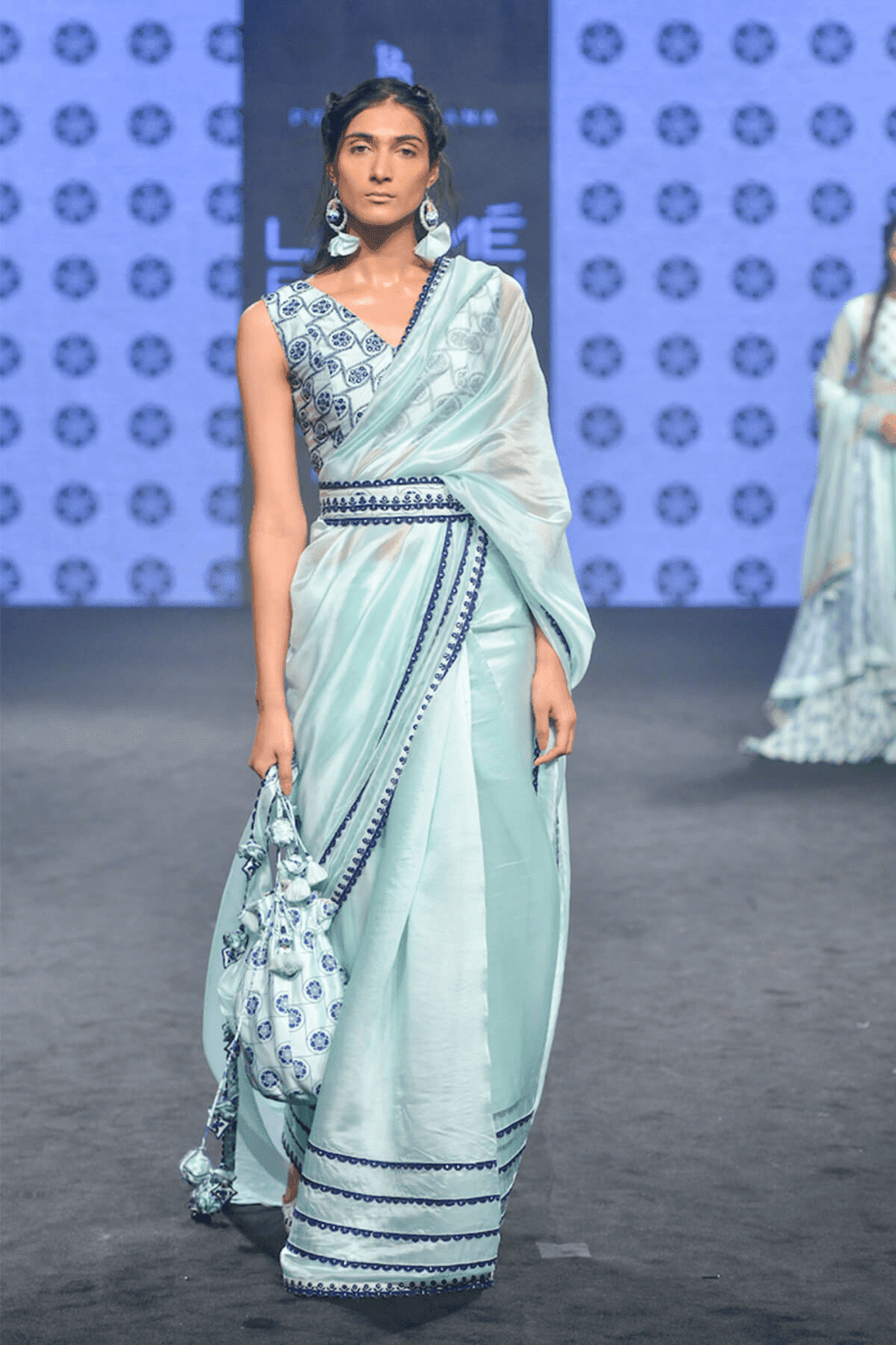 Powder Blue Saree Paired With Blouse