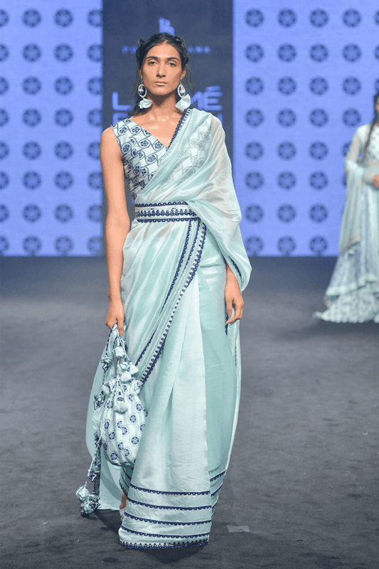Powder Blue Saree Paired With Blouse